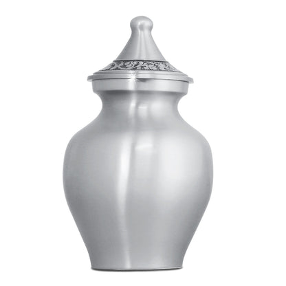 Small pewter-finish aluminum urn with a celestial star pattern, five and a half inches tall