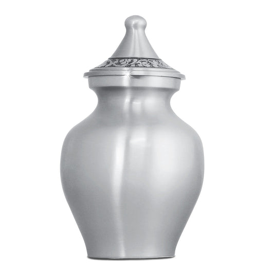 Small pewter-finish aluminum urn with a celestial star pattern, five and a half inches tall