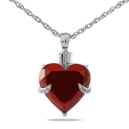 Wide stainless steel locket pendant, an inch across, with a screw top worked into the profile