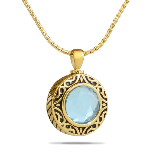 Small ice blue glass keepsake sphere set in gold-toned steel with a threaded top