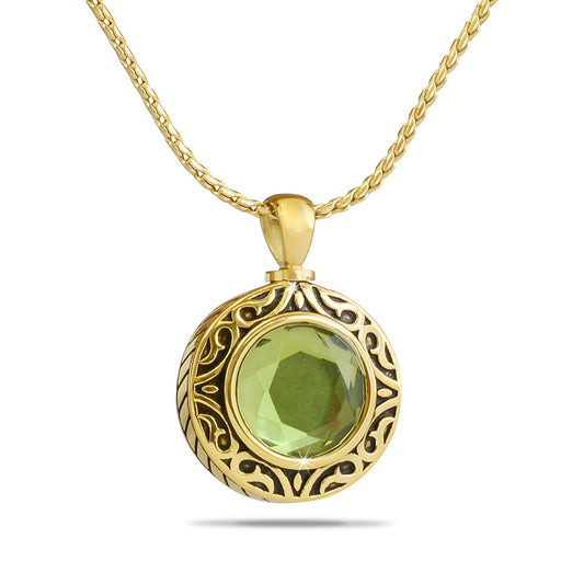 Gold-toned steel bead charm ringed with pale peridot green glass and a screw closure