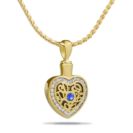Gold-toned steel heart pendant edged with clear crystals and a small top opening