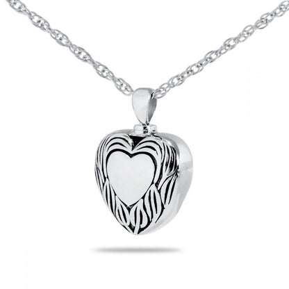 Smooth silver heart-shaped cremation pendant with a polished finish, on a silver chain