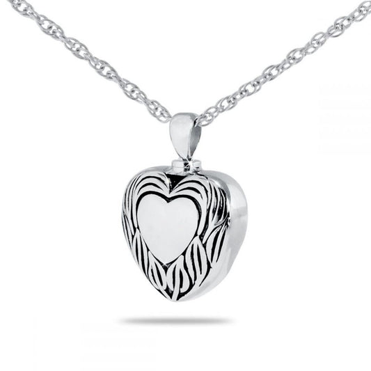 Smooth silver heart-shaped cremation pendant with a polished finish, on a silver chain