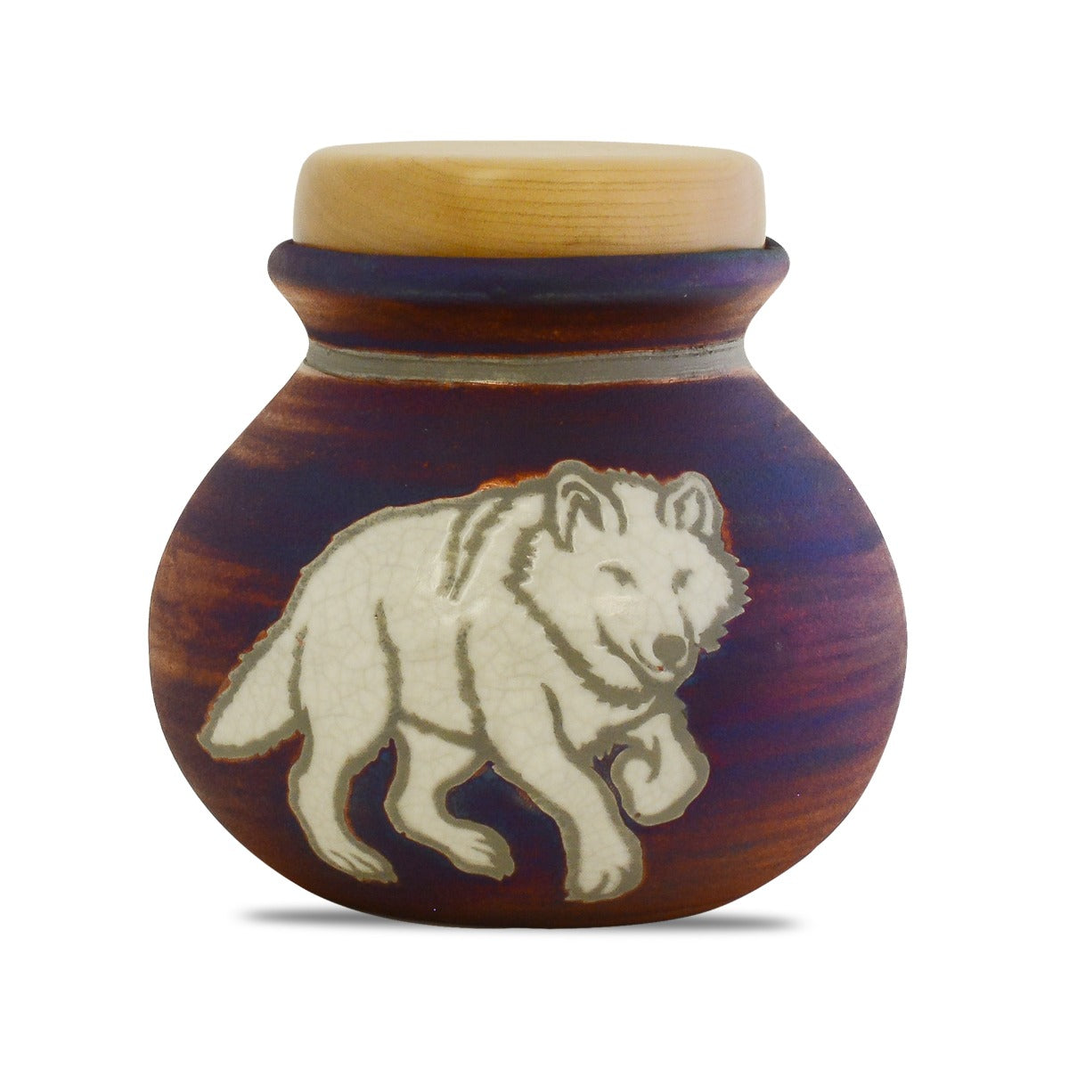 Round raku ceramic keepsake urn with a wolf motif on a metallic crackled glaze
