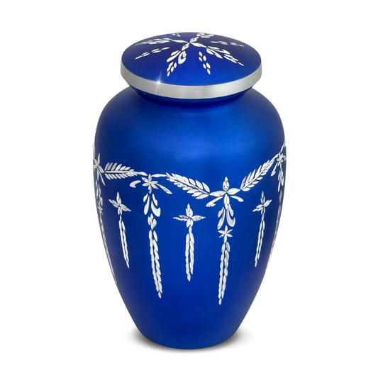 Blue aluminum cremation urn with angled diamond-cut bands over a shimmer finish