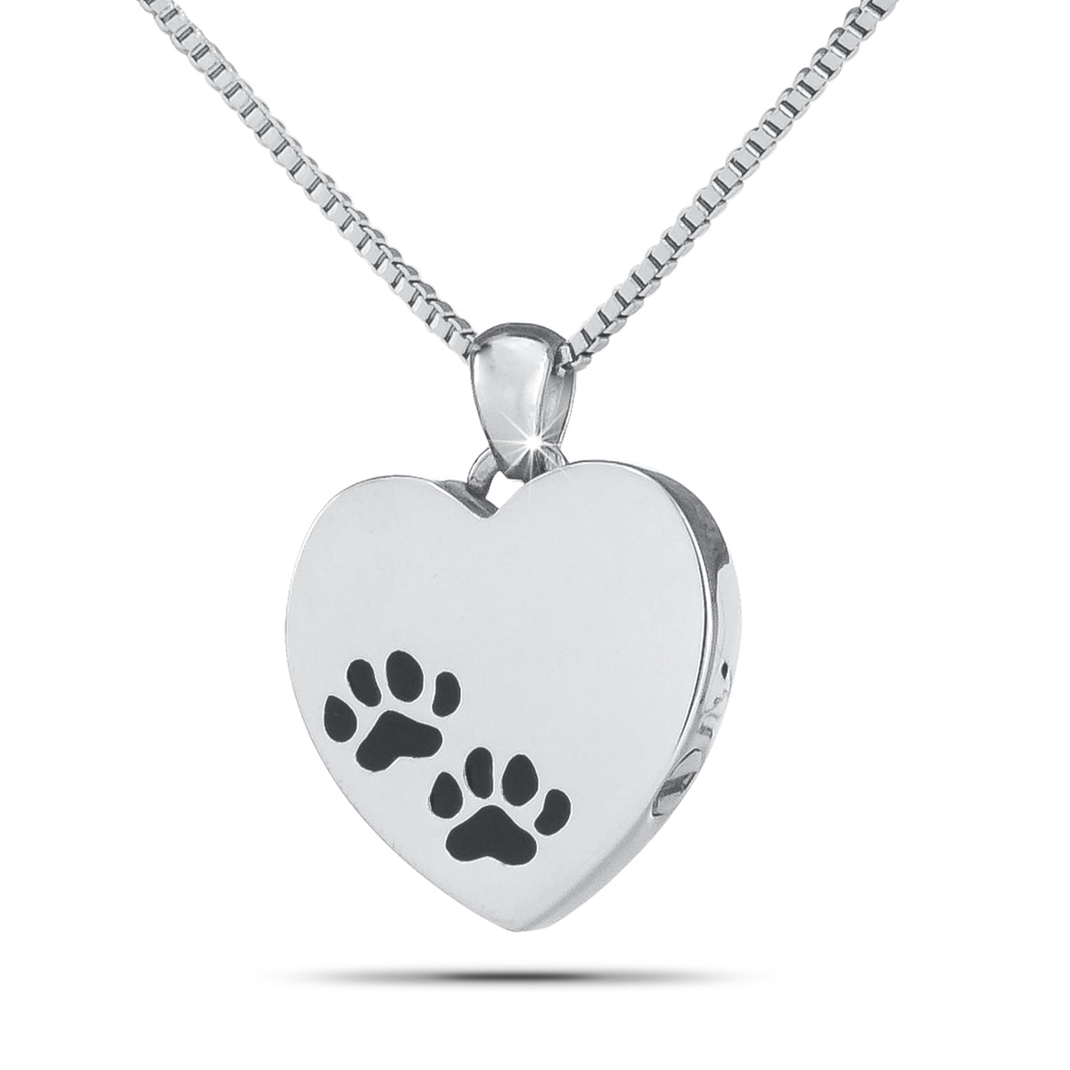 Slim stainless steel heart pendant with a cut-out paw print, just over an inch tall