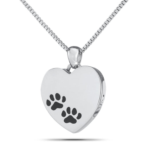 Slim stainless steel heart pendant with a cut-out paw print, just over an inch tall