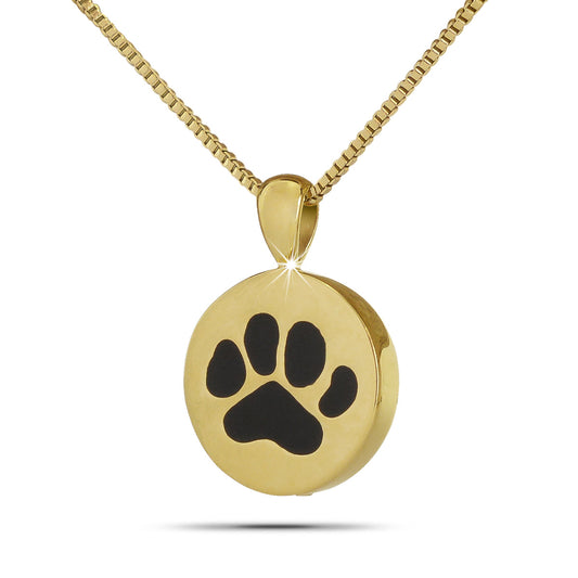 Gold-toned steel pendant with a paw print in relief on a round polished face