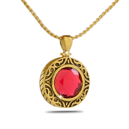 Small pink glass keepsake orb in a gold-toned steel mount with a screw top closure