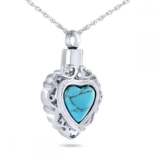 Silver heart cremation pendant inset with a mottled blue-green turquoise stone