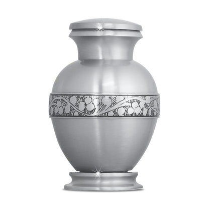 Compact brass keepsake urn with a plain smooth body and a removable top lid