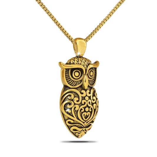 Gold-toned steel owl pendant with pressed feather detail and large round eyes