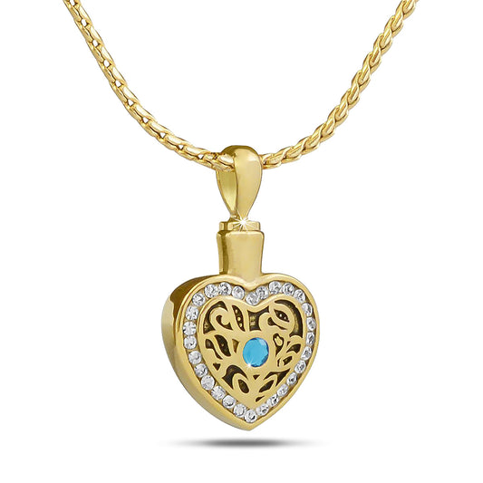 Gold-toned steel pendant set with a bright blue topaz stone, just over an inch tall
