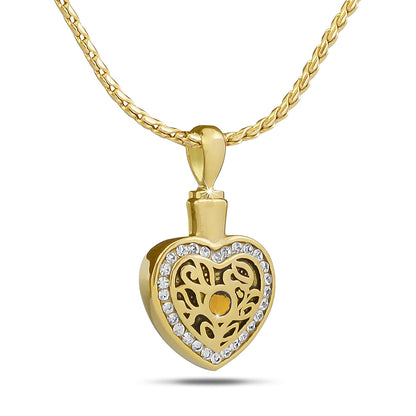 Gold-tone steel keepsake urn set with a clear cubic zirconia stone on the front
