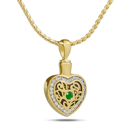 Gold-toned steel pendant set with a deep green emerald colored stone