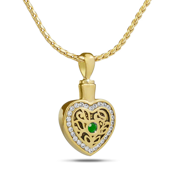 Gold-toned steel pendant set with a deep green emerald colored stone