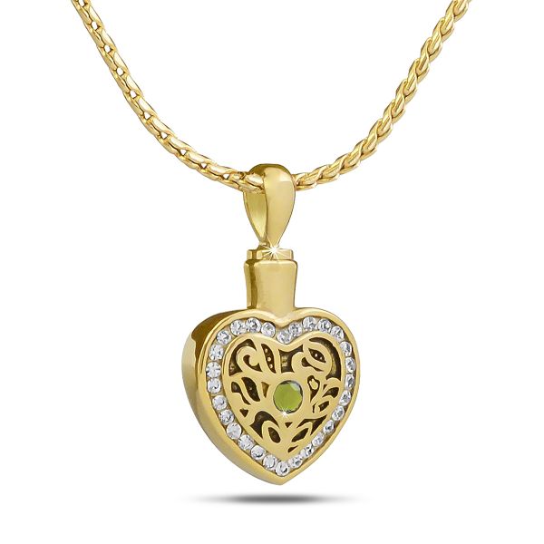 Gold-toned steel pendant set with a green peridot stone, an inch wide and slightly taller