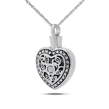 Stainless steel cremation pendant with a color-shifting alexandrite stone for June