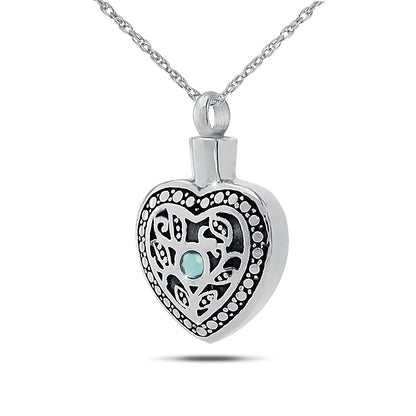 Steel cremation pendant with a pale blue aquamarine stone set in a mirrored face