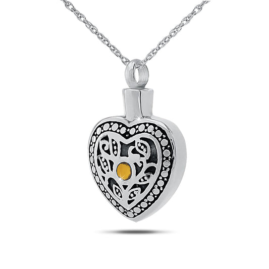 Polished steel cremation pendant set with a warm amber citrine stone at the center