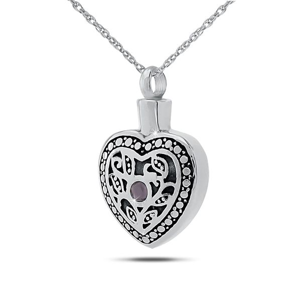 Sterling silver keepsake urn about an inch tall set with a purple amethyst stone