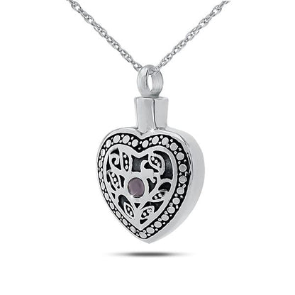 Sterling silver keepsake urn about an inch tall set with a purple amethyst stone