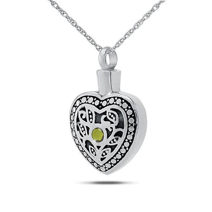Upright silver pendant set with an olive peridot, opening by a screw at the top