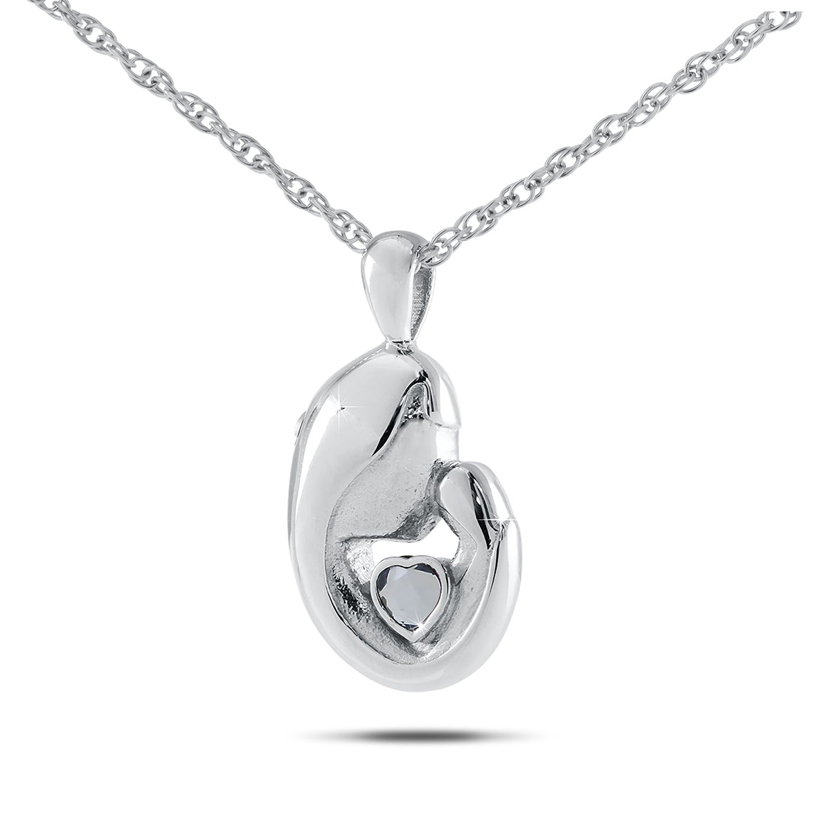 Stainless steel keepsake urn with a heart cut into the front and a purple-blue stone
