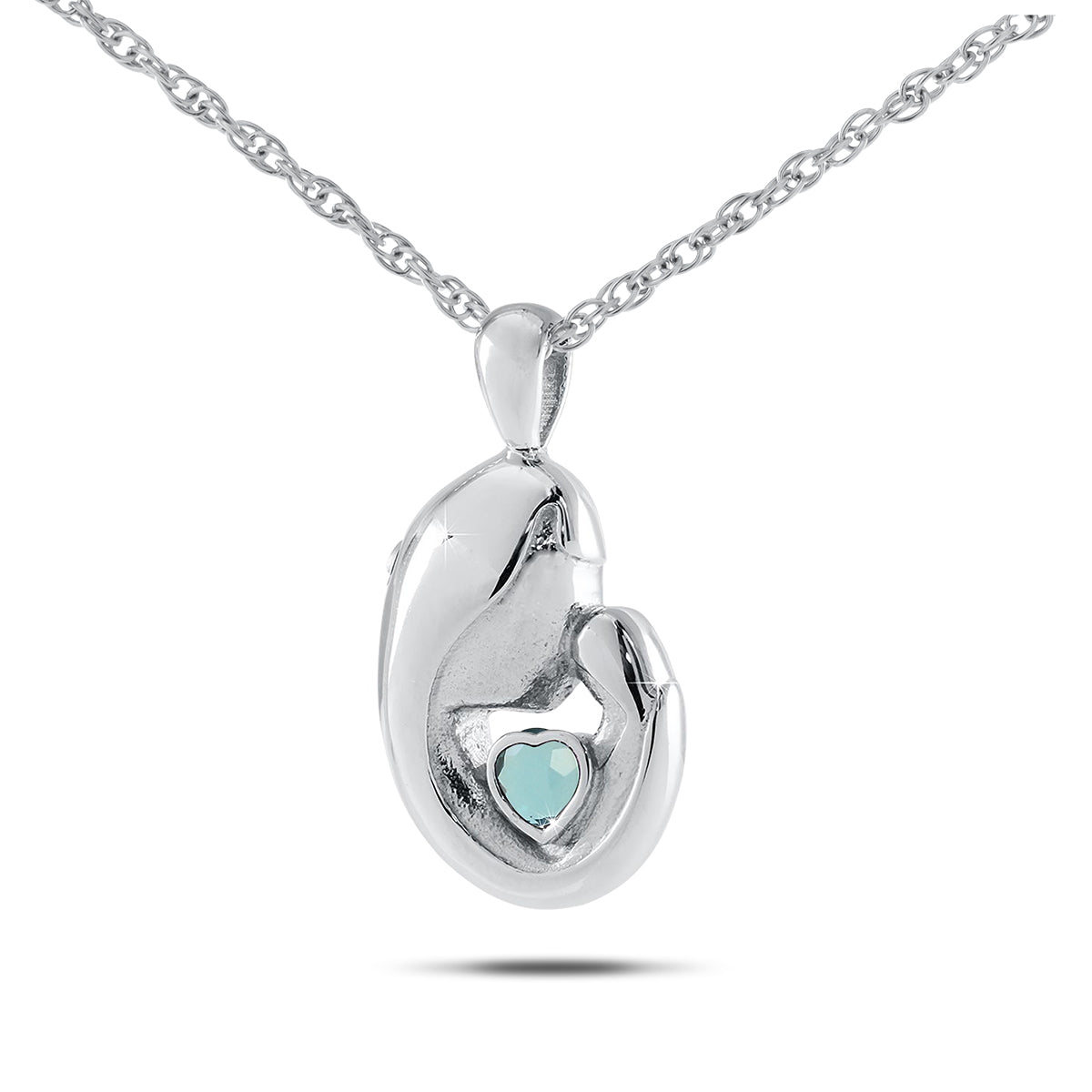 Round sterling silver keepsake pendant with a pale blue aquamarine stone
