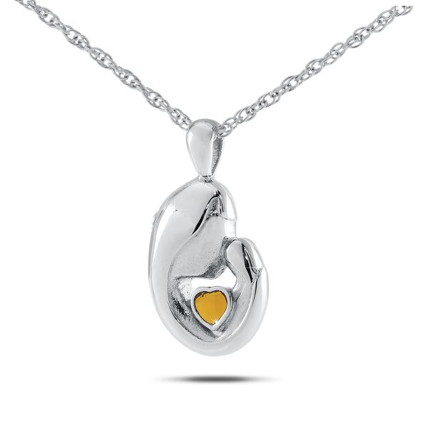 Small sterling silver keepsake pendant set with a golden-yellow citrine stone