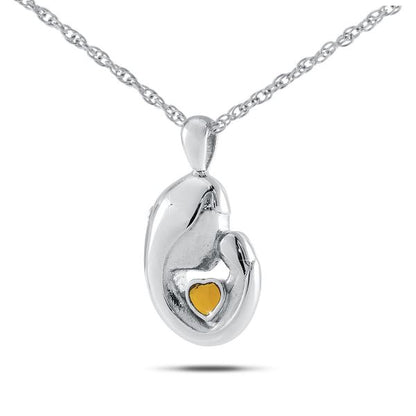 Small sterling silver keepsake pendant set with a golden-yellow citrine stone