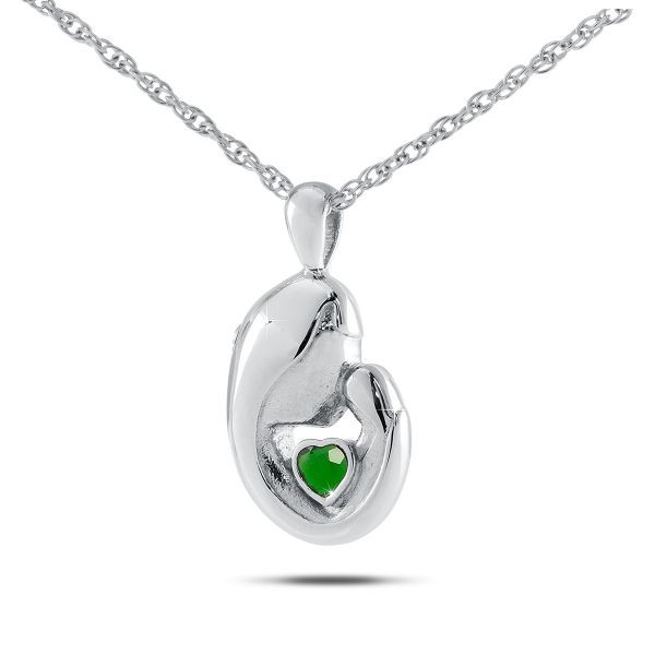 Round sterling silver keepsake pendant with a green emerald set at its centre