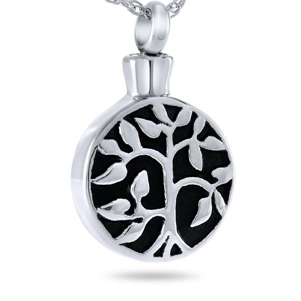 Silver pendant with a cut-out tree of life motif and spreading branches