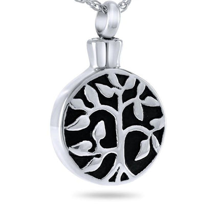 Silver pendant with a cut-out tree of life motif and spreading branches