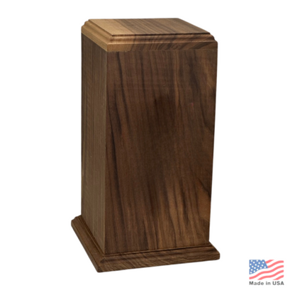 Tall walnut urn in dark chocolate-brown wood with a square base and stepped lid
