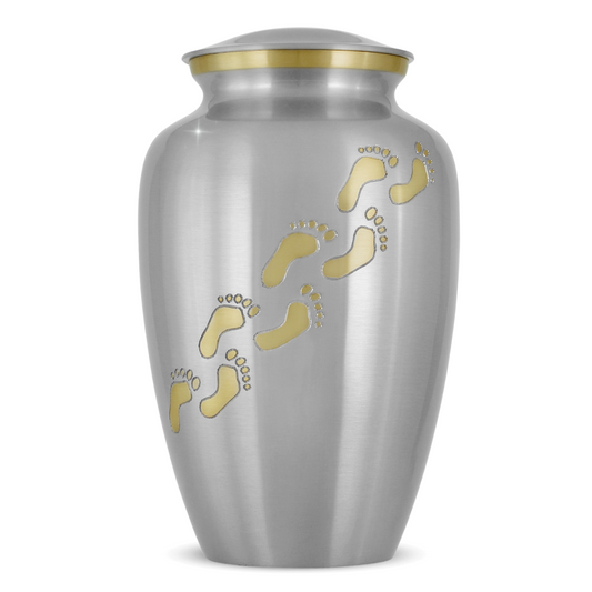 Tall polished brass cremation urn with a narrow neck, flared shoulders and a domed lid