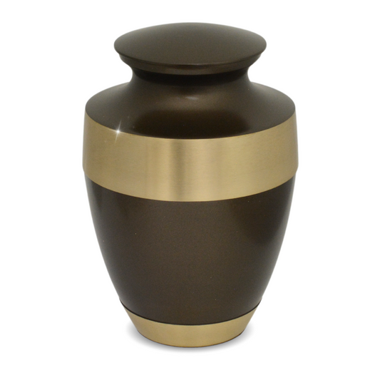 Brass cremation urn with a worked patterned surface, rounded body and a fitted lid