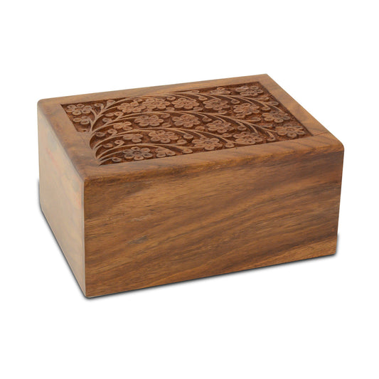 Large wooden pet urn with daisy detailing and a smooth natural wood finish