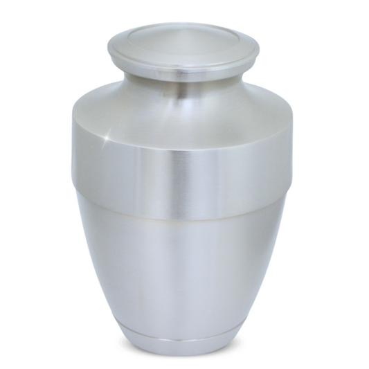 Polished brass cremation urn with a tapered body, ribbed foot and lift-off lid
