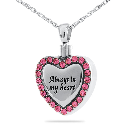 Polished stainless steel heart pendant set with small pink stones along one edge