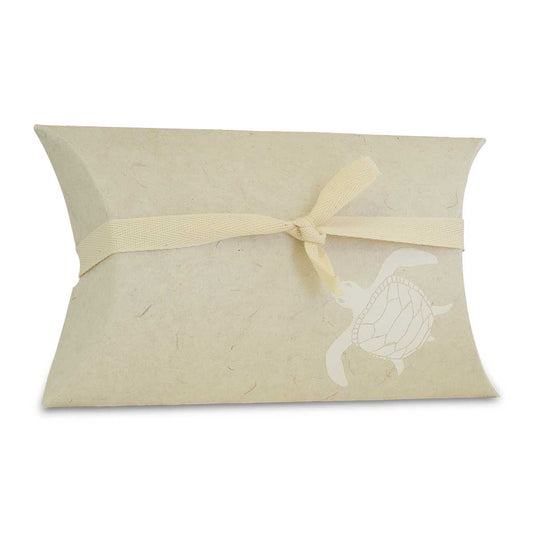 Turtle-shaped biodegradable paper urn with a patterned shell and a side opening