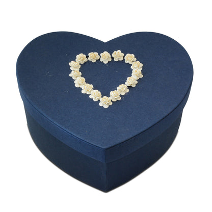 Blue heart-shaped paper companion urn with a matte surface and separate lift-off top lid