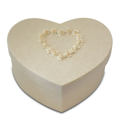 Ivory heart-shaped biodegradable paper companion urn with a plain unpolished finish