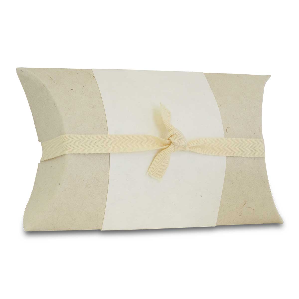 Small sand-colored biodegradable paper urn, six inches long with a low profile and side opening