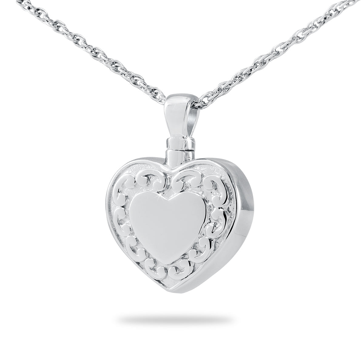 Plain polished silver heart-shaped cremation pendant with an unmarked face, on a chain