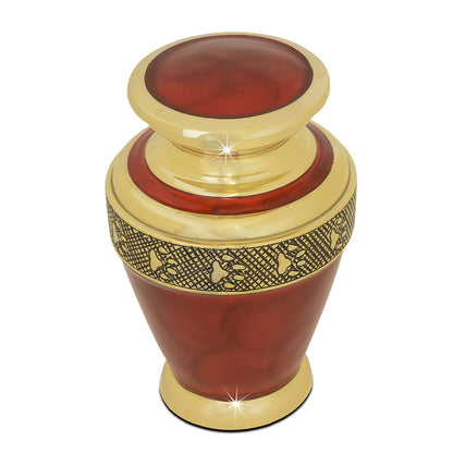 Compact brass pet urn with a square body and rounded shoulders, about four inches tall