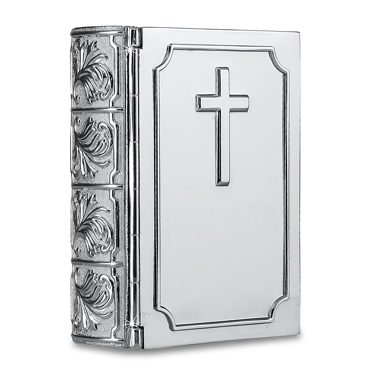 Small metal cremation urn shaped like a closed Bible, lying flat and book-like
