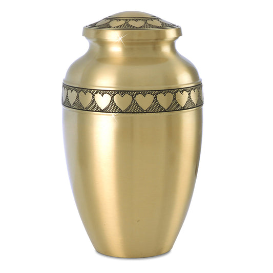Brass cremation urn with a ring of linked hearts running around the middle