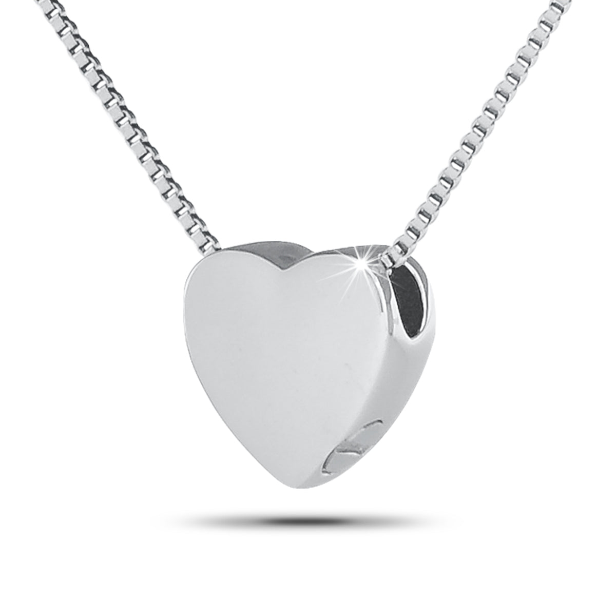 Stainless steel Sacred Heart pendant with crown of thorns and flame worked into the surface